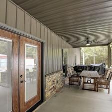 Two-Tone-Barndomium-with-Upstairs-Living-Space-in-Portland-TN 28